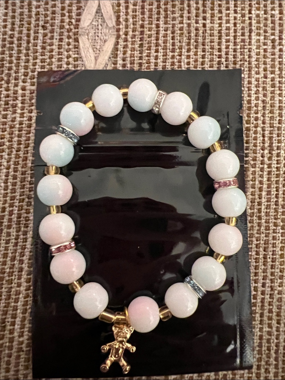 Handmade glass bead bracelet with bear charm